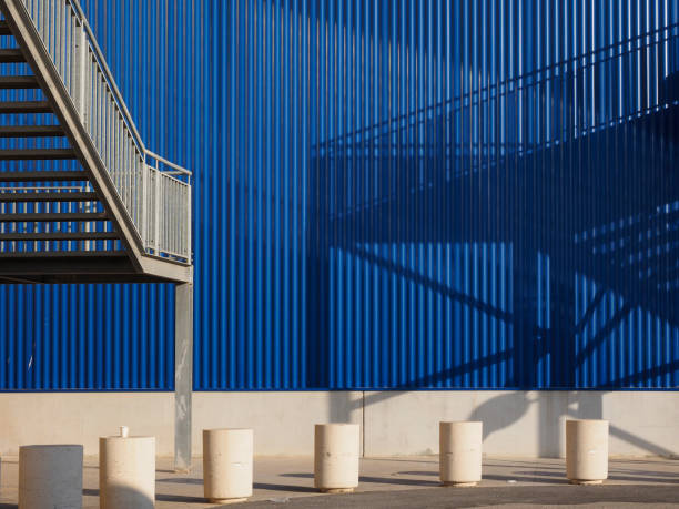 istock Metallic stairs outside a warehouse 1251359505