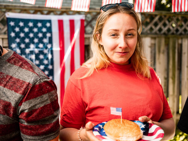istock Burger line up at 4th July BBQ 1251373051