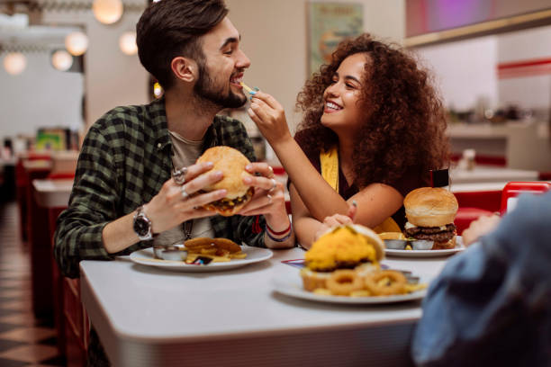 istock She loves sharing her food with him 1251374686