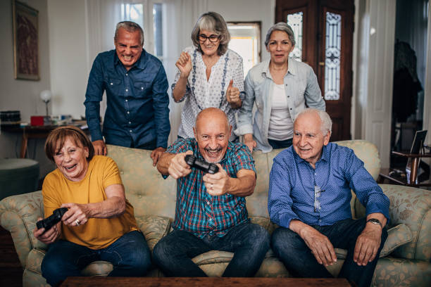 istock Old people playing video games 1251374739