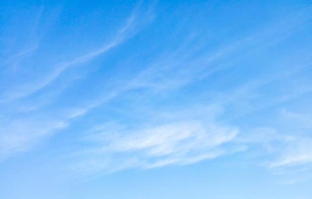 istock Beautiful blue sky with few clouds on bright  sunny day 1251376166
