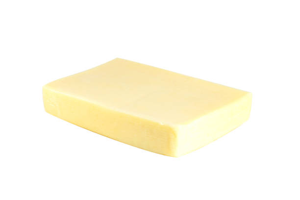 istock One beige rectangular slice of milky cheese isolated on white background 1251377911