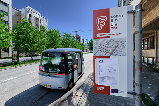 Helsinki, Finland - June 12, 2020: The FABULOS Project - testing self-driving bus in city street in Pasila district.