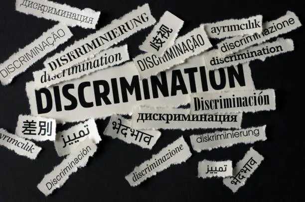 Discrimination on world news. "Discrimination" word on newspaper headlines (in 12 different languages)