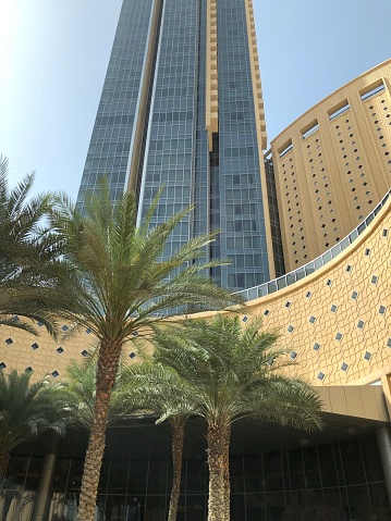 dubai city skyline under blue sky, united arab emirates.