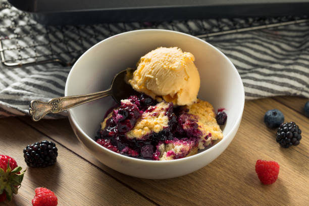 istock Homemade Berry Cobbler with Ice Cream 1251386065