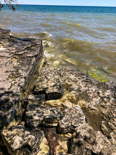 The view of this rocky shoreline of Lake Michigan was observed at Whitefish Dunes in Door County, Wisconsin.