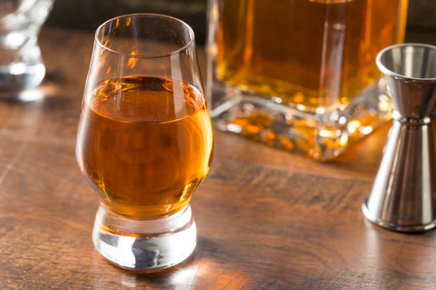 istock Boozy Amber Whiskey in a Snifter 1251389837
