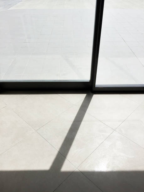 istock Sliding glass door and tiled floor 1251389994