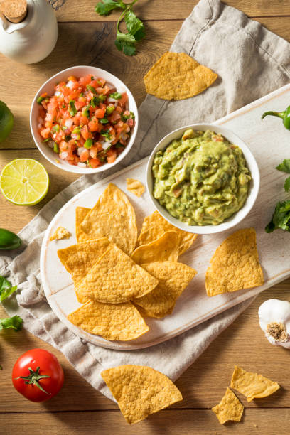 istock Homemade Tortillas Chips with Salsa and Guacamole 1251392045