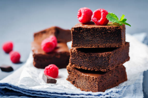 istock Chocolate cake Brownie with raspberries 1251396993
