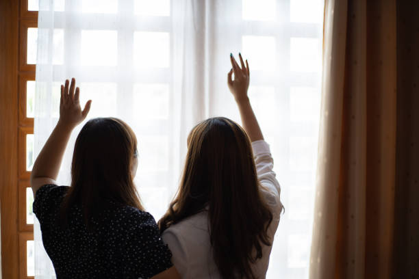 istock Two Christian people are praying to encourage and support together. 1251403308