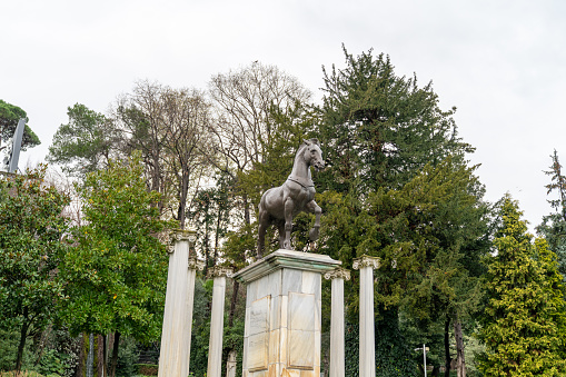 Istanbul, Turkey - December 2019: Famous horse sculpture in the garden of Sakip Sabanci Museum in Emirgan