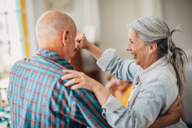 istock Happy old couple dancing 1251406808