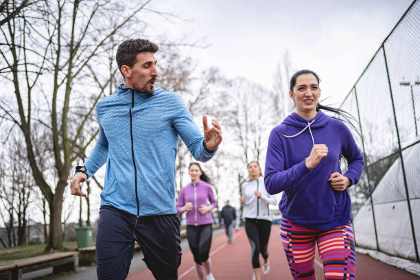 istock Fitness instructor explaining the benefits of running to his client 1251408135