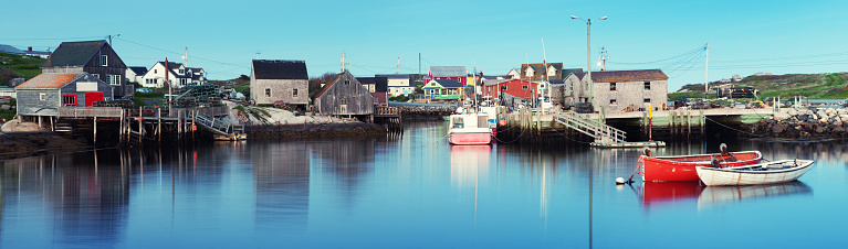 A panoramic view of Peggy's Cove at dusk.