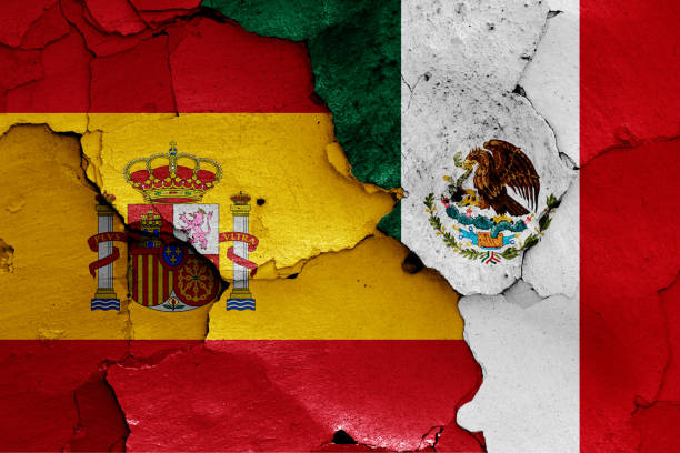 istock flags of Spain and Mexico painted on cracked wall 1251409931