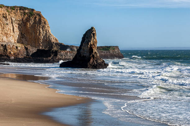 istock Rocky Cliffs,. Beach and Waves Along California Coast 1251410650