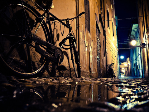 Dark Alley with Bicycle. Location: Ferrara, Italy
