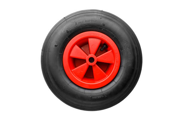 istock wheelbarrow spare wheel tire, isolated on white 1251412323