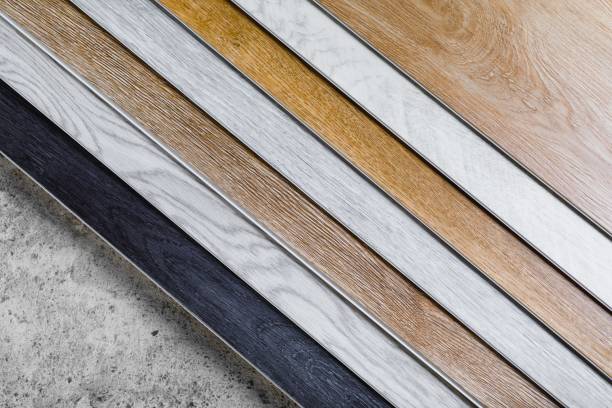 laminate flooring planks variations on concrete floor