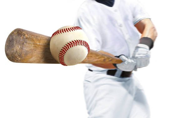 giocatore di baseball che colpisce palla con pipistrello su sfondo bianco - wooden bat foto e immagini stock