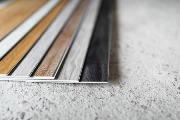istock laminate flooring planks variations on concrete floor 1251413231