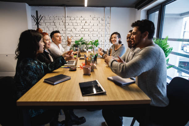 istock Team meeting brimming with positive energy 1251415320