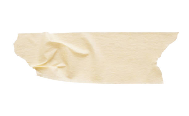istock Yellow adhesive paper tape isolated on white background 1251415350