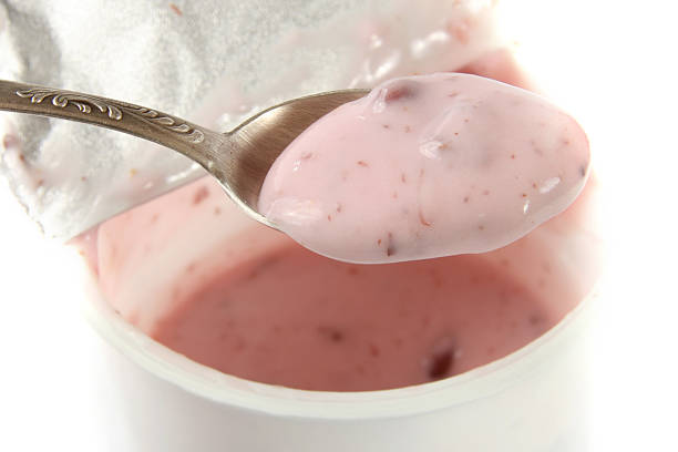 istock spoon of yogurt 125141573