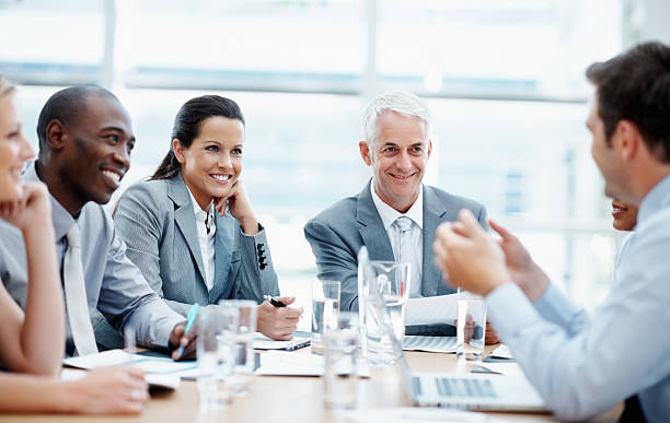 istock Happy professionals having a meeting 125141921