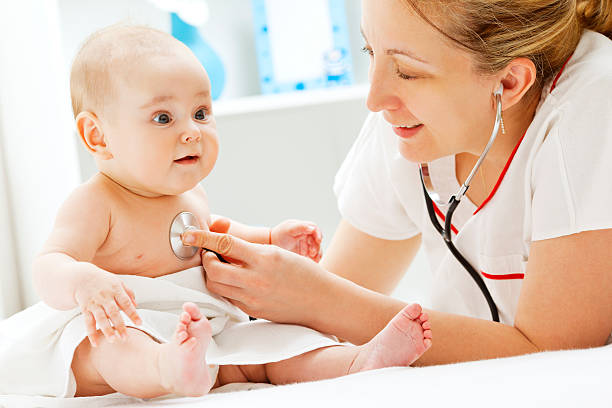 istock Pediatrician checking baby patient 125142204