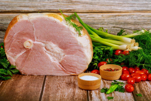 istock Ham with fresh dill, chive and tomato on wooden table.. 1251423027