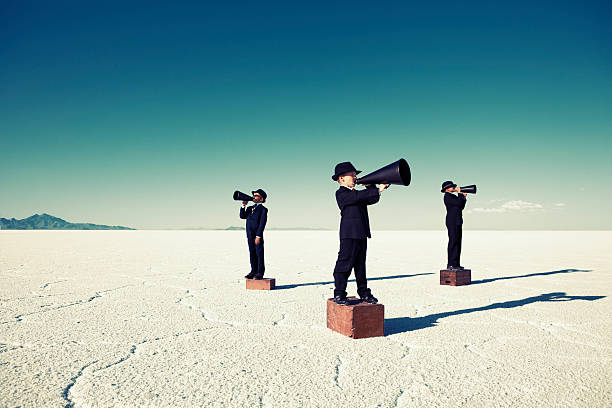 istock Child Business Team Yell Through Megaphones 125142319