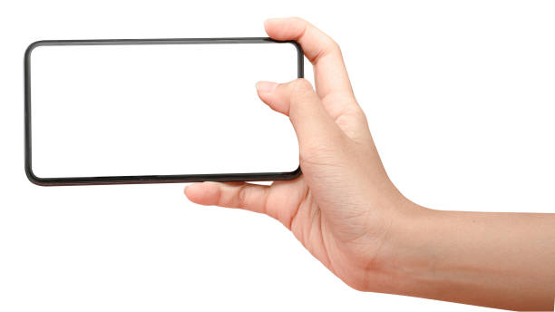 istock Hand holding phone isolated on white background with clipping path. 1251424647