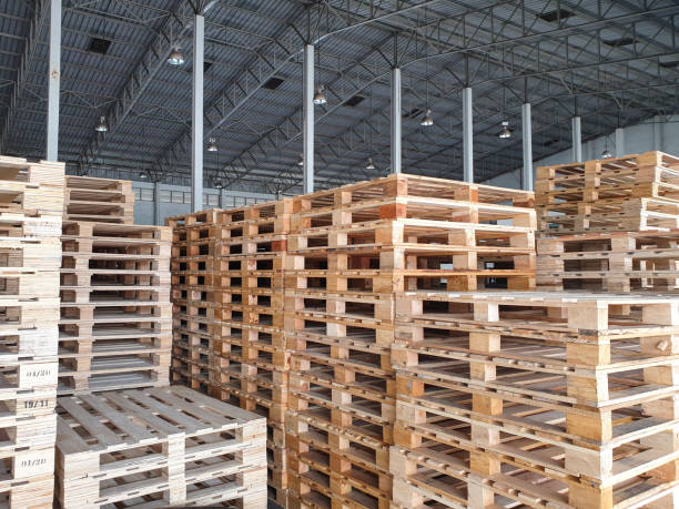 istock Stack of wooden pallet in warehouse  storage. Material for Industry and transportation 1251424925