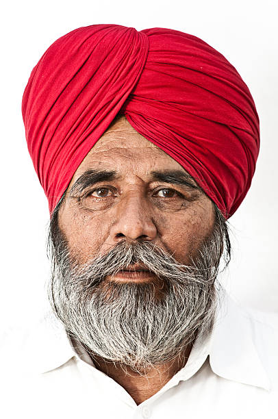 Indian Senior Man Indian horse trader in Pushkar. India. turban stock pictures, royalty-free photos & images