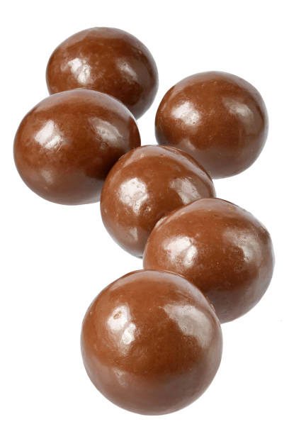 istock Chocolate balls close up isolated 1251430232