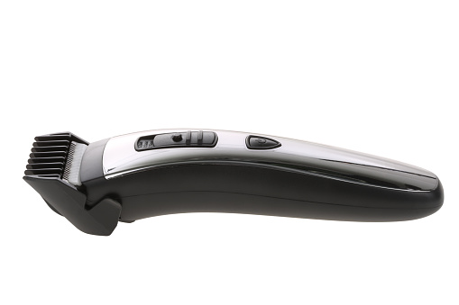 electric hair clipper on white background