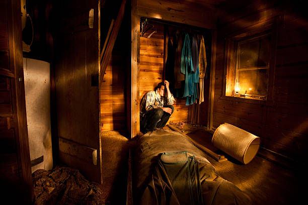 istock Man hiding in an abandoned closet 125143319