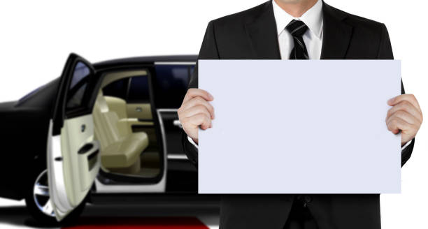 istock chauffeur holding signage waiting for passenger 1251434085
