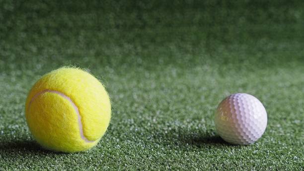 istock Golf and Tennis balls 1251434327