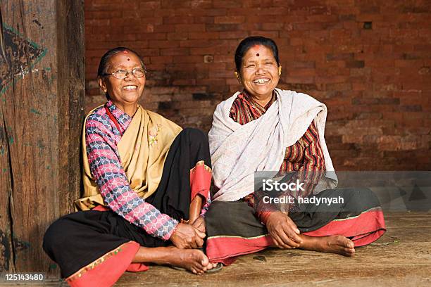 Two Happy Nepali Women In Bhaktapur Durbar Square Stock Photo - Download Image Now - Women, Active Seniors, Activity