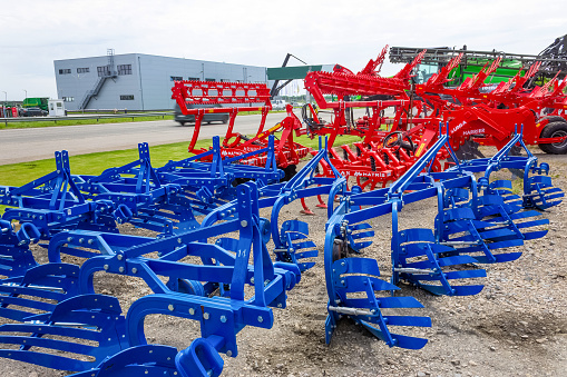 Kyiv, Ukraine - June 16, 2020: Tractor and Unia cultivator on the land for minimum-tillage technology at Kyiv, Ukraine on June 16, 2020.