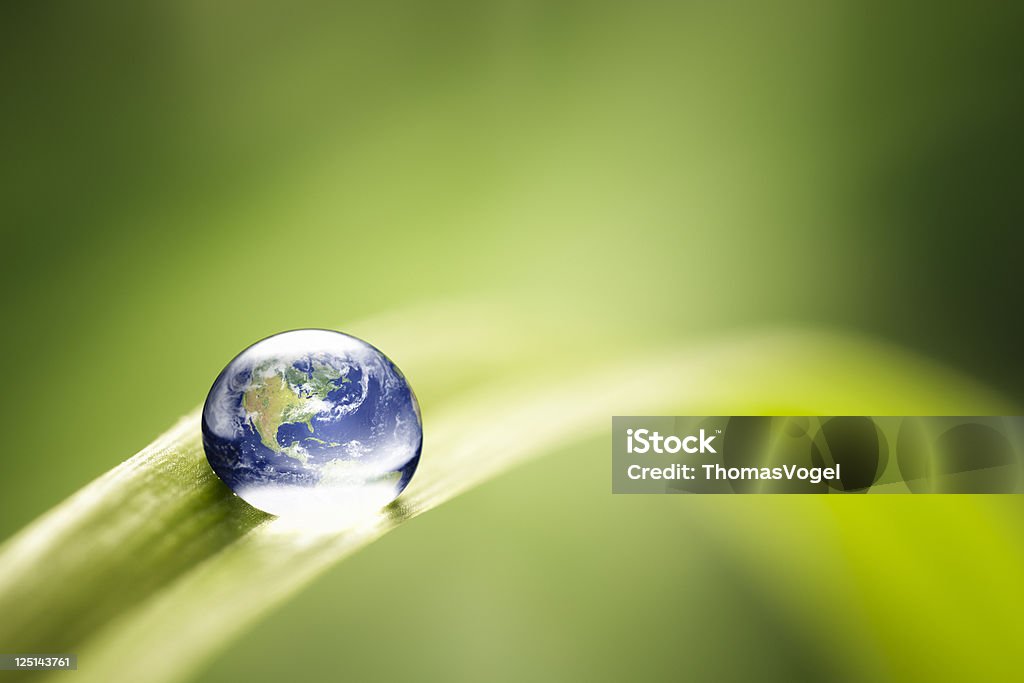 World in a drop - Nature Environment Green Water Earth http://www.thomas-vogel.de/istock/is_planetearth.jpg Environmental Conservation Stock Photo