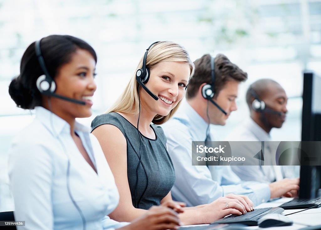 Assistenza clienti di lavoro - Foto stock royalty-free di Call centre