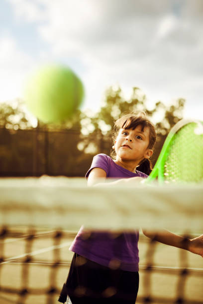vincere swing - tennis child teenager childhood foto e immagini stock