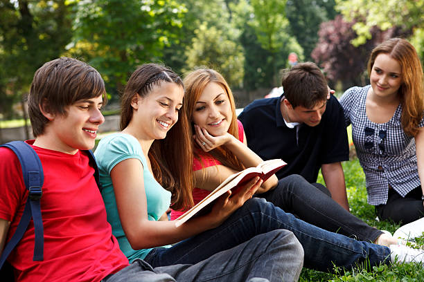 istock Young college students relaxing outdoors 125144778