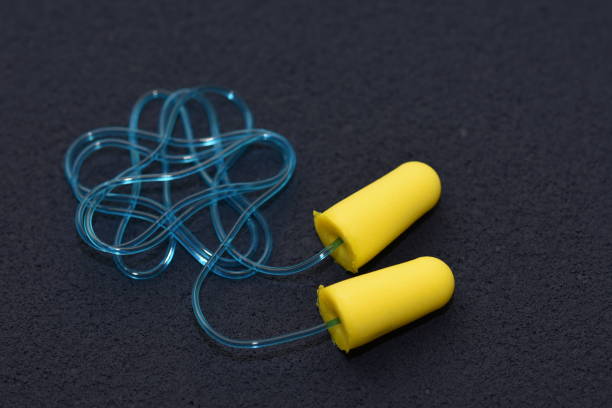 istock 1 set of green earplugs for ear protection 1251453608