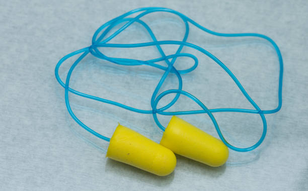 istock 1 set of green earplugs for ear protection 1251453618
